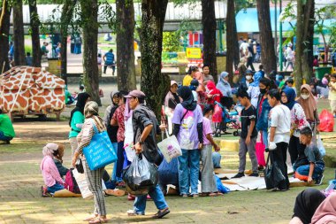 Jakarta, Indonesia in December 2022. The Zoo in Ragunan is one of the favorite places for small and large families which is very crowded during holidays. In this place children can get to know various kinds of animals.