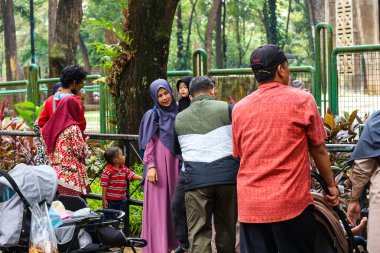 Jakarta, Indonesia in December 2022. The Zoo in Ragunan is one of the favorite places for small and large families which is very crowded during holidays. In this place children can get to know various kinds of animals.