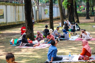 Jakarta, Indonesia in December 2022. The Zoo in Ragunan is one of the favorite places for small and large families which is very crowded during holidays. In this place children can get to know various kinds of animals.