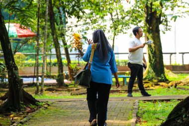 Jakarta, Indonesia in December 2022. The Zoo in Ragunan is one of the favorite places for small and large families which is very crowded during holidays. In this place children can get to know various kinds of animals.