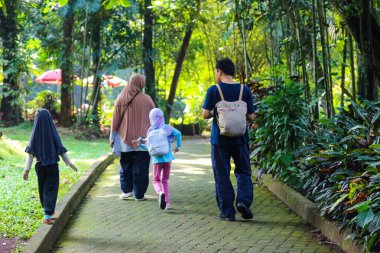 Jakarta, Indonesia in December 2022. The Zoo in Ragunan is one of the favorite places for small and large families which is very crowded during holidays. In this place children can get to know various kinds of animals.