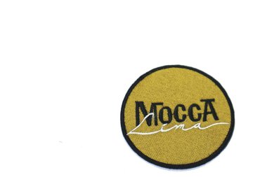 Jakarta, Indonesia in May 2022. The cloth embroidered emblem reads Mocca, one of the famous bands in Indonesia originating from Bandung. This emblem is yellow with black writing.