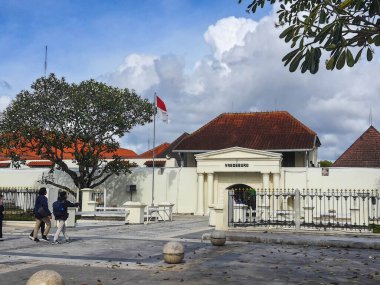 Yogyakarta, Indonesia in November 2022. The front entrance gate of the Fort Vredeburg Museum, you can see several visitors passing in front of it. Located in the Agung Building and the Yogyakarta Sultanate Palace.