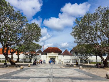 Yogyakarta, Indonesia in November 2022. The front entrance gate of the Fort Vredeburg Museum, you can see several visitors passing in front of it. Located in the Agung Building and the Yogyakarta Sultanate Palace.