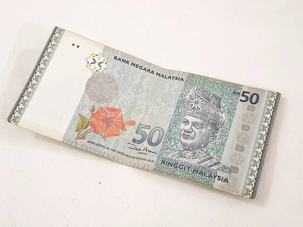 一张林吉特马来西亚人钞票的孤立的白色照片 适用于马来西亚人金融或个人金融的例证 — 图库照片
