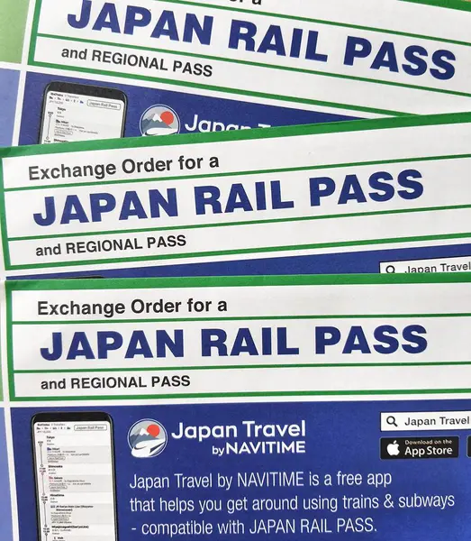 Stock image Jakarta, Indonesia on July 31, 2023. Three sheets of Exchange Order for a Japan Rail Pass and regional pass paper in order to get your JR Pass once you arrive in Japan.