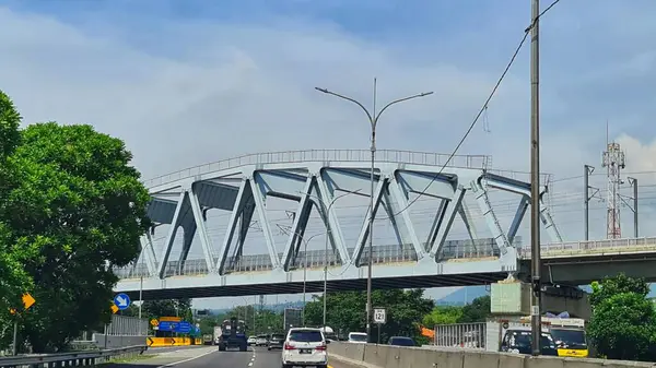 stock image West Bandung, Indonesia on December 12, 2023. The KCIC Padalarang Steel Bridge, West Bandung stretches across the Padaleunyi Toll Road. Steel structures are sturdy and lighter than concrete. Fast.