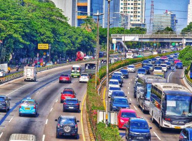 Jakarta, September 5 2024. Very congested traffic in the morning on Jalan MT Haryono, Cawang. Traffic jams cannot be avoided because many office employees use cars to go to work. Office area. clipart