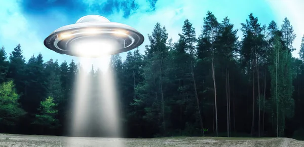 Unidentified flying object UFO using teleporting beam in middle of forest