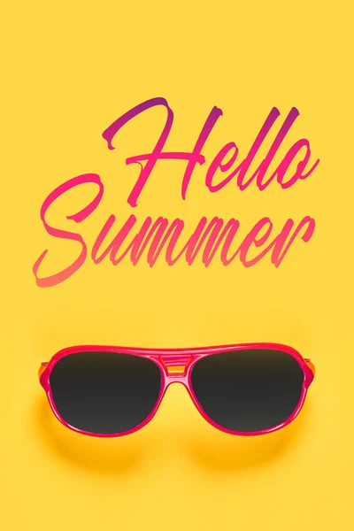 sunglasses with the words hello summer written in pink and red on top, next to it is an orange background that says hello summer