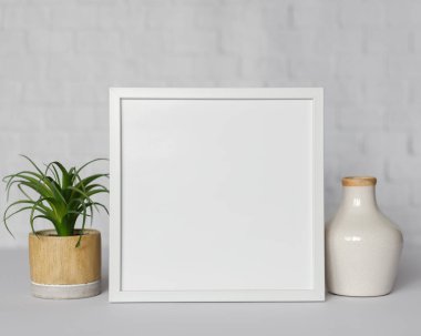 Boş Çerçeve, Modern ev dekorasyonu, resim, fotoğraf veya yazdırma sunumu için kopyalama alanı olan beyaz minimalist odada çerçeve modeli