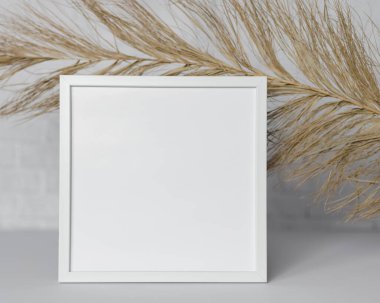 Boş Çerçeve, Modern ev dekorasyonu, resim, fotoğraf veya yazdırma sunumu için kopyalama alanı olan beyaz minimalist odada çerçeve modeli