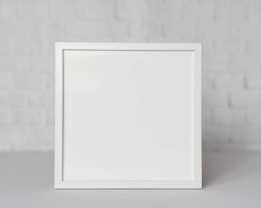 Boş Çerçeve, Modern ev dekorasyonu, resim, fotoğraf veya yazdırma sunumu için kopyalama alanı olan beyaz minimalist odada çerçeve modeli