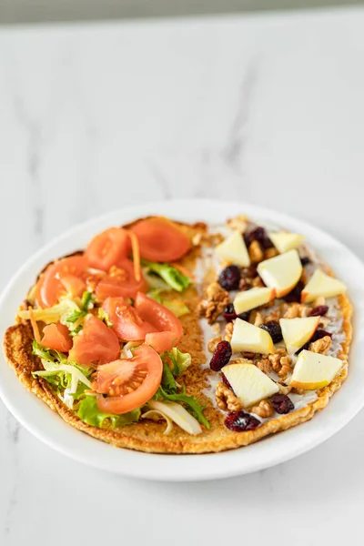 delicious fresh salad with chicken, cheese and vegetables