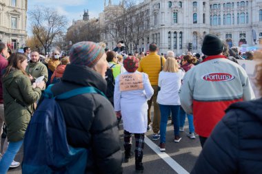 Madrid, Spain - February 12, 2023: Demonstration of citizens and doctors in defense of public health care in the streets of Madrid.