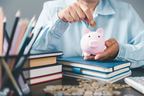 Saving money coin with banking investment, finance education concept. Planning student loan for studying abroad for college or university degree. Future children's education fund cash. Growing saving