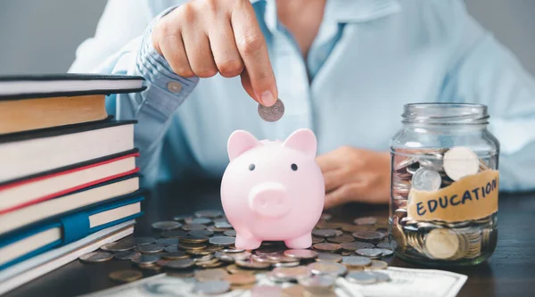 Saving money coin with banking investment, finance education concept. Planning student loan for studying abroad for college or university degree. Future children's education fund cash. Growing saving