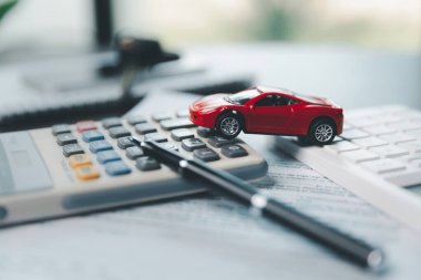 Insurance claim accident car form, Car loan, insurance and leasing time. Planning to manage transportation finance costs. Concept of car insurance business, saving buy with tax and loan for new car.