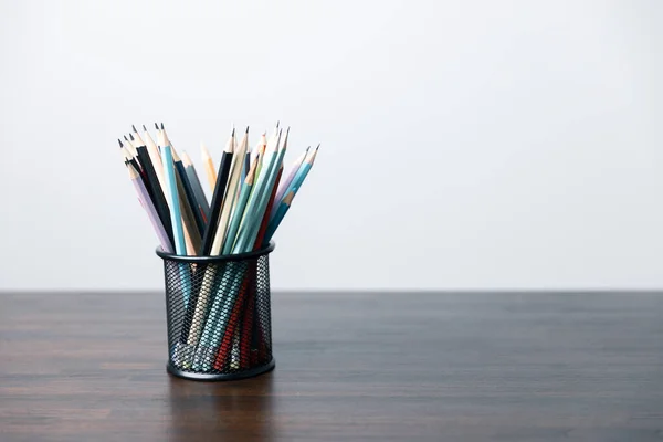 stock image Back to school concept symbol. School education need equipment pencil, pen, notebook, colour, draw. there are many pens and pencils are in the plastic box. School objects, supply all stationery.