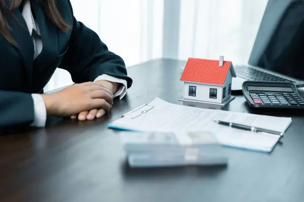 Banks approve loans to buy homes. Real estate agents explain the document for customers who come to contact to buy a house, buy or sell real estate concept.