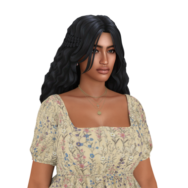 Çiçek desenli bir elbise giyen, uzun siyah kıvırcık saçlı, koyu tenli, güzel bir kadın.