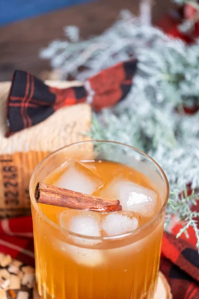 Strong Whiskey Glass Ice Cinnamon Stick Juniper Branch Background Christmas — Stock Photo, Image