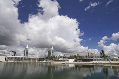 Lisbon, Portugal Olivais Dock in Parque das Nacoes aka Nations Park. View of Pavilion of Portugal. Atlantico Arena Sao Rafael Towers clipart