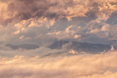 fog and clouds on the valley at sunset