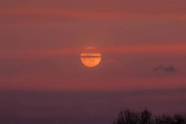 abstract moon and clouds at sunset