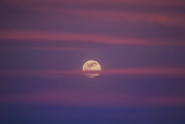 abstract moon and clouds at sunset