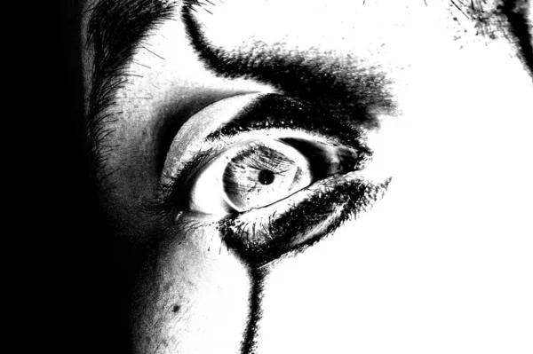 black and white image of female eye