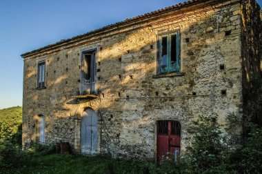 abandoned peasant house in ruins