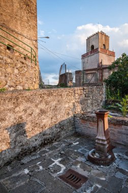 ancient rusty iron fountain in the historic center