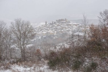 ancient snow-covered medieval village