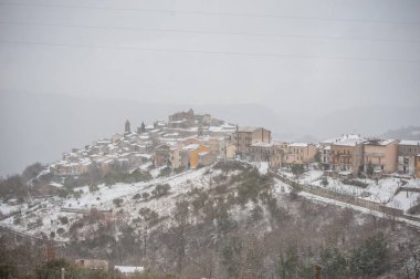 ancient snow-covered medieval village