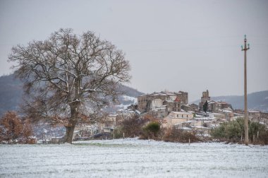 ancient snow-covered medieval village