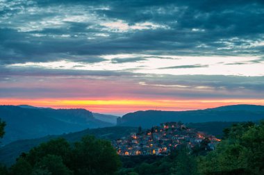 old town at sunset and city lights