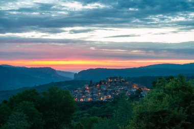 old town at sunset and city lights