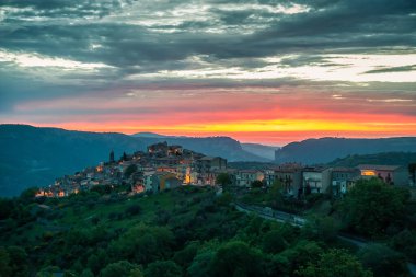 old town at sunset and city lights