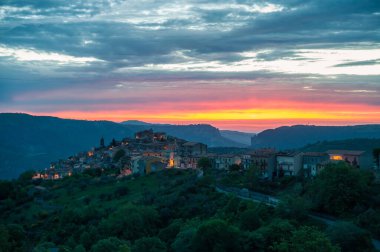 old town at sunset and city lights
