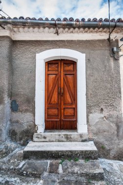 abandoned house and ancient wooden doors