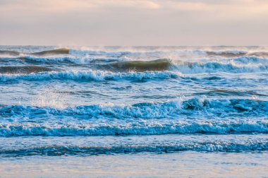 waves at sunrise sea at morning, colorful sea