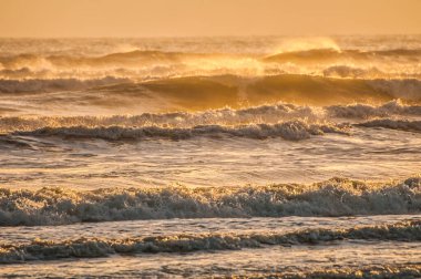 waves at sunrise sea at morning, colorful sea