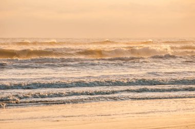 waves at sunrise sea at morning, colorful sea