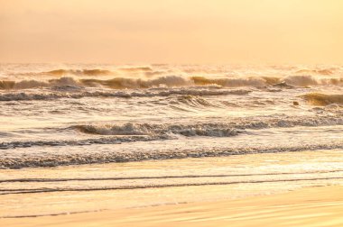 waves at sunrise sea at morning, colorful sea