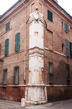facade of building made of bricks, red bricks, ferrara,