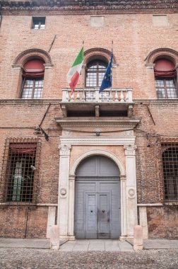building facade made of bricks, red bricks, ferrara