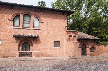facade  of building made of bricks, ferrara