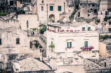house and flowers, view of the old city of Matera