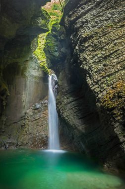 waterfalls of paradise river creates waterfalls between the crevasse waterfall between rocky walls water with an emerald green color wild waterfalls  wild waterfalls pristine places
